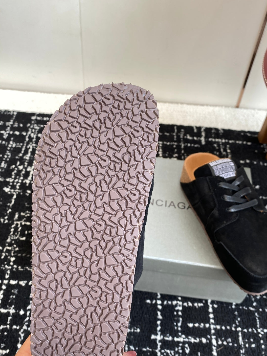 Balenciaga dark suede lace-up shoes, textured rubber outsole close-up