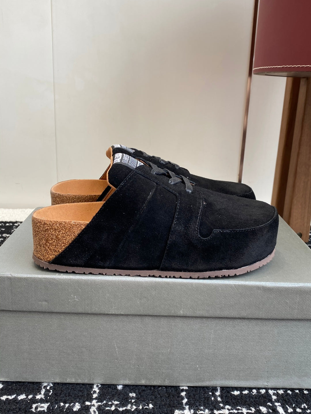 Balenciaga dark suede lace-up shoes with tan outsole, side view