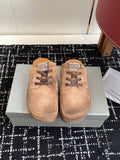 Balenciaga suede lace-up sandals in tan, front view pair