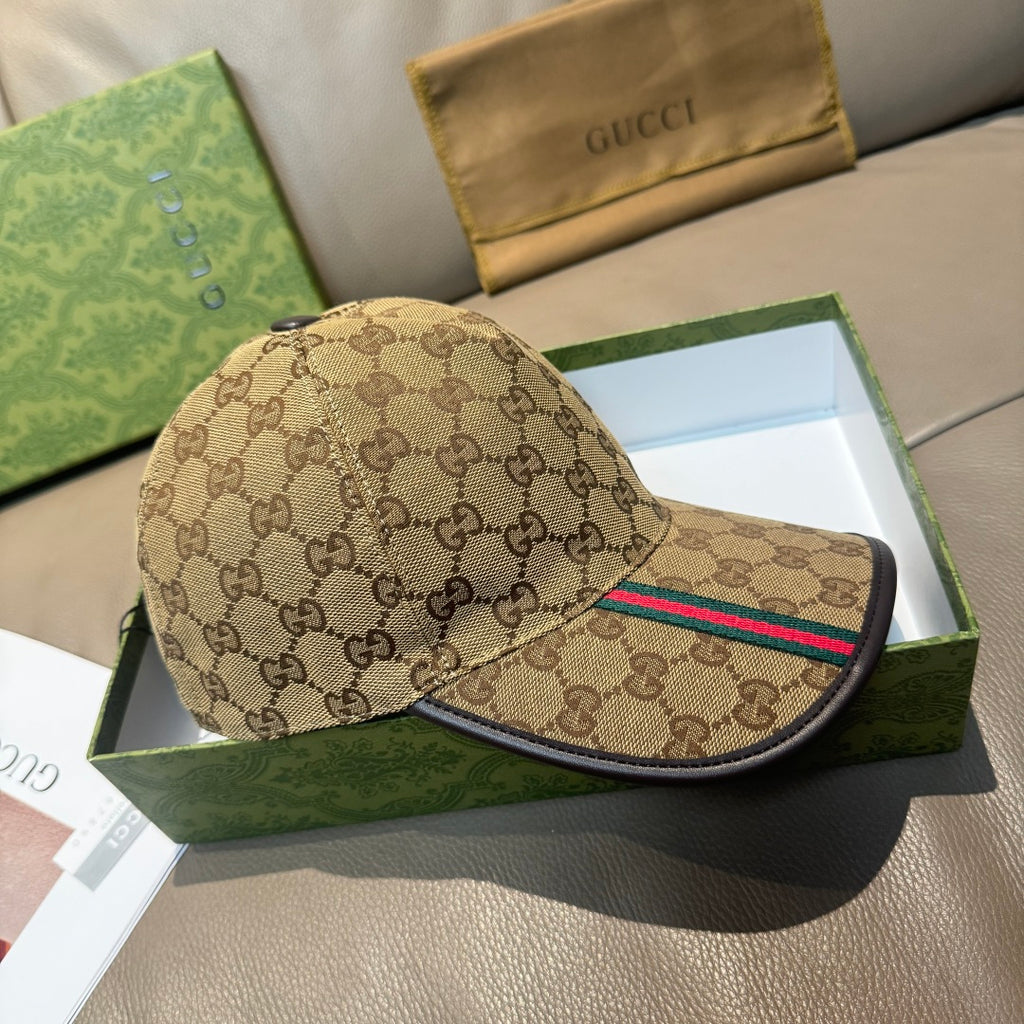 Tan GG baseball cap with black brim, multicolor Web stripe, and adjustable strap