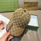 Tan GG baseball cap with dark button top and multicolor Web stripe detail
