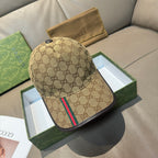 Gucci baseball cap in tan GG canvas with black brim and multicolor Web stripe