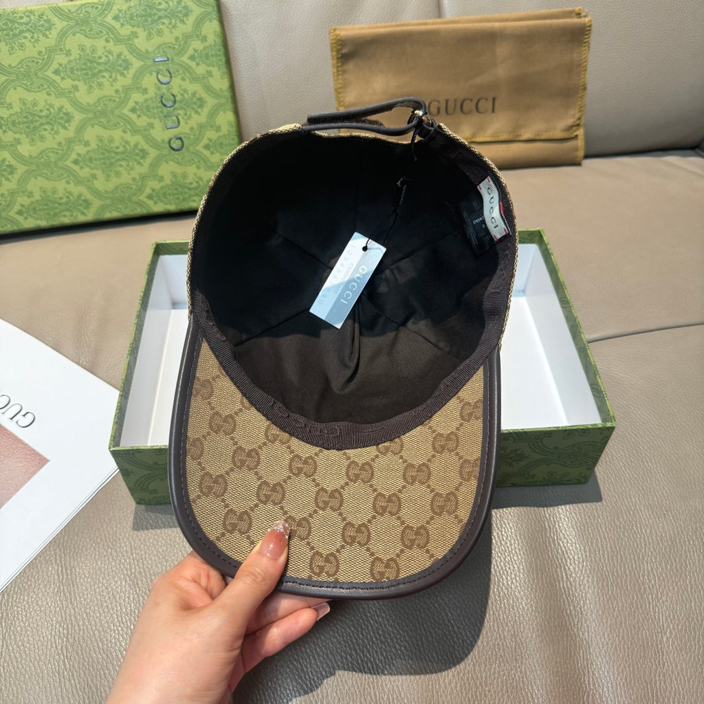 Baseball cap with tan GG outer and dark interior lining