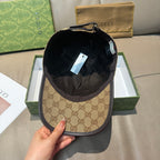 Baseball cap with tan GG outer and dark interior lining
