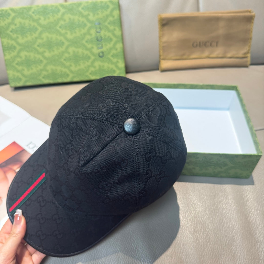 Black Gucci baseball cap with GG monogram and round top button
