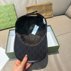 Black Gucci baseball cap interior view with adjustable strap and back panel