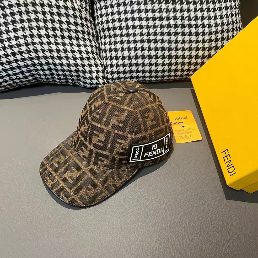 Brown monogram baseball cap with front logo patch and curved brim