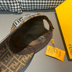 Brown monogram baseball cap interior view with adjustable strap and hanging tags
