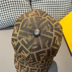 Brown monogram baseball cap top with circular fabric button