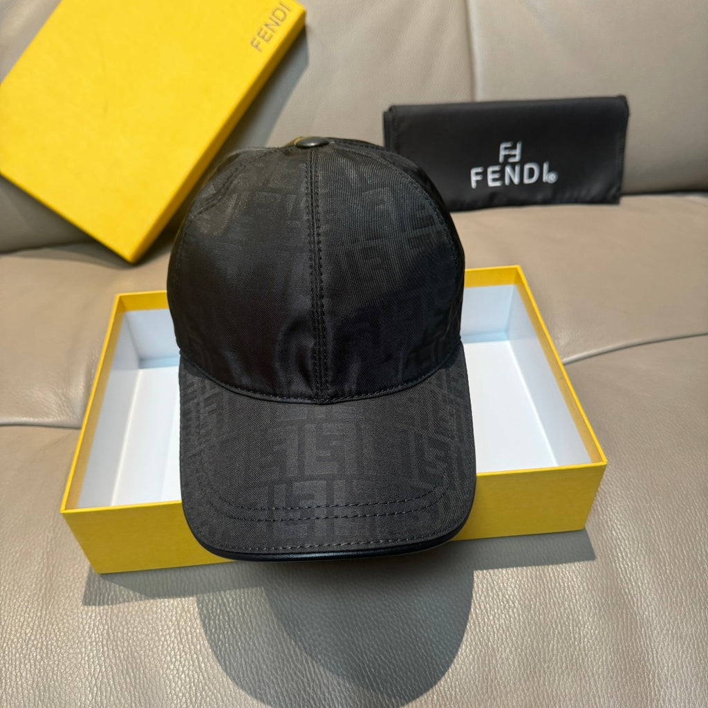 Fendi monogram baseball cap, dark patterned fabric with curved brim and front seams.