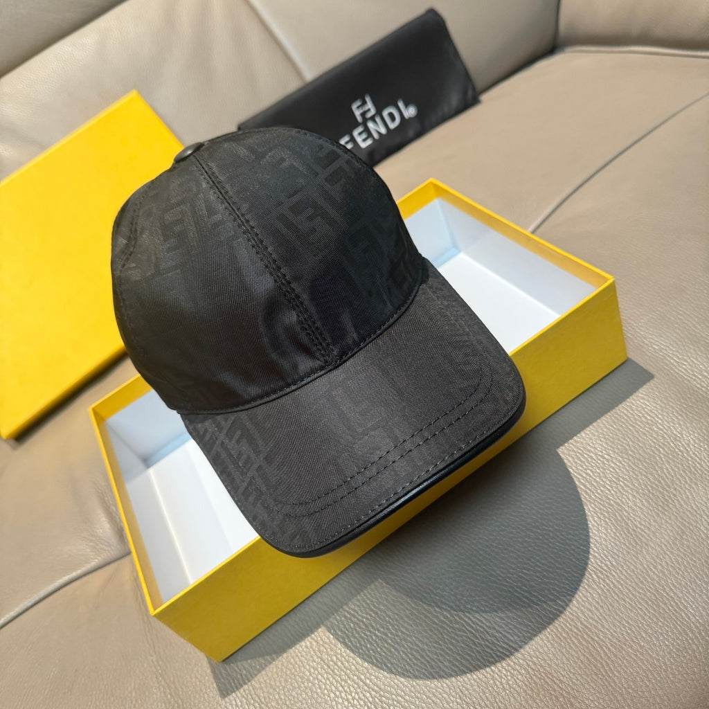 Fendi monogram baseball cap in dark fabric, side view with curved brim and stitched panel.