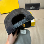 Fendi monogram baseball cap inside view, dark fabric with adjustable strap and buckle.
