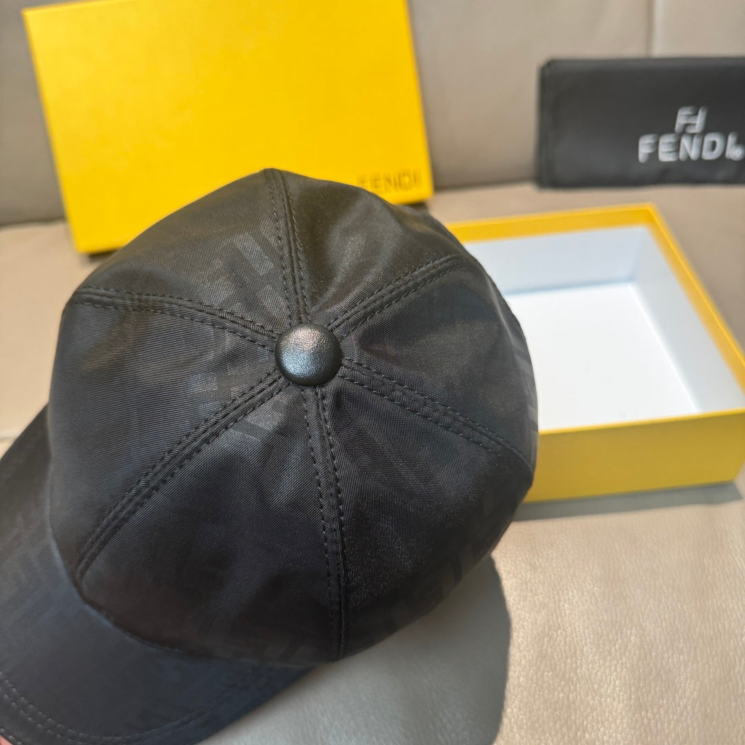 Fendi monogram baseball cap top, dark fabric with center button and visible panel stitching.