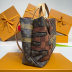 Louis Vuitton monogram tote bag, angled view with patchwork trim and top handles