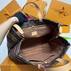 Louis Vuitton tote bag interior with beige lining and open top pocket