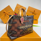 Louis Vuitton monogram tote bag, front view with patchwork panels and top handle