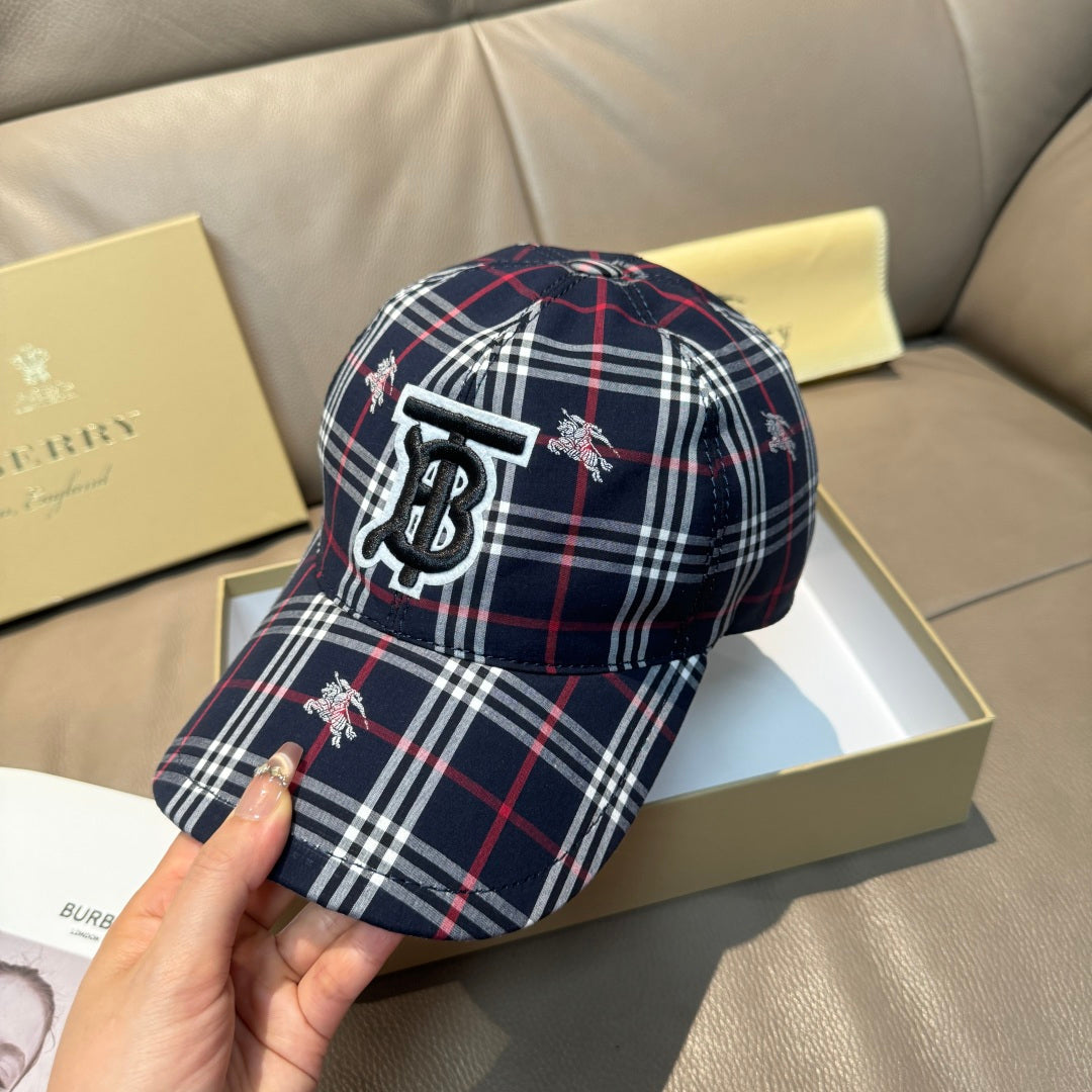 Burberry plaid baseball cap close-up of TB logo and horse motifs