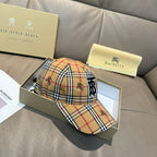 Two plaid baseball caps with embroidered monogram logo: tan/red/black/white and matching style