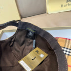 Inside view of a dark fabric baseball cap with size label and product tag