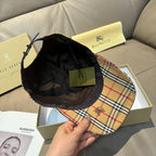 Plaid baseball cap with dark interior lining and adjustable strap; stitched brim edge