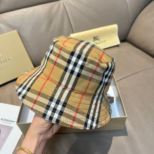 Plaid bucket hat, side profile with beige black red tartan check.