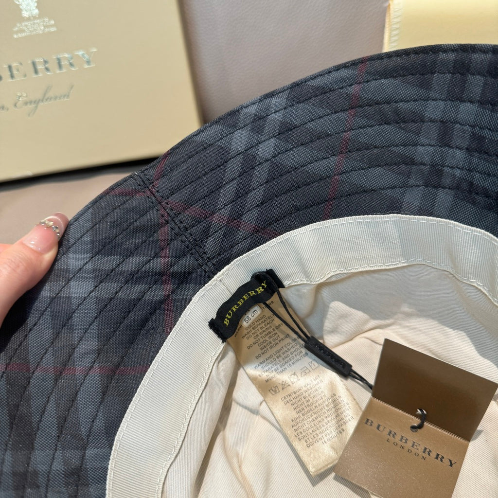 Burberry dark navy plaid bucket hat close-up of interior lining and tag labels