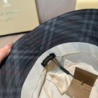 Burberry dark navy plaid bucket hat close-up of interior lining and tag labels