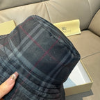 Burberry dark navy plaid bucket hat close-up of brim seam and tartan pattern