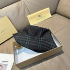 Burberry dark navy tartan bucket hat laid in box, wide curved brim
