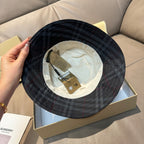 Burberry dark navy plaid bucket hat, inside label view with adjustable strap