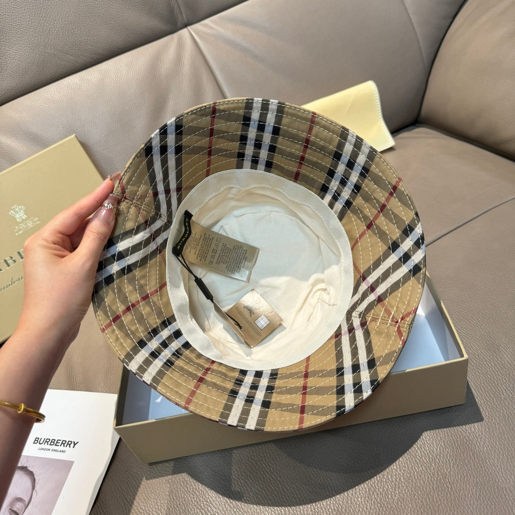Burberry plaid bucket hat with beige crown and black/red inner label detail