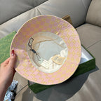 Gucci bucket hat interior view with white lining and pink GG outer brim