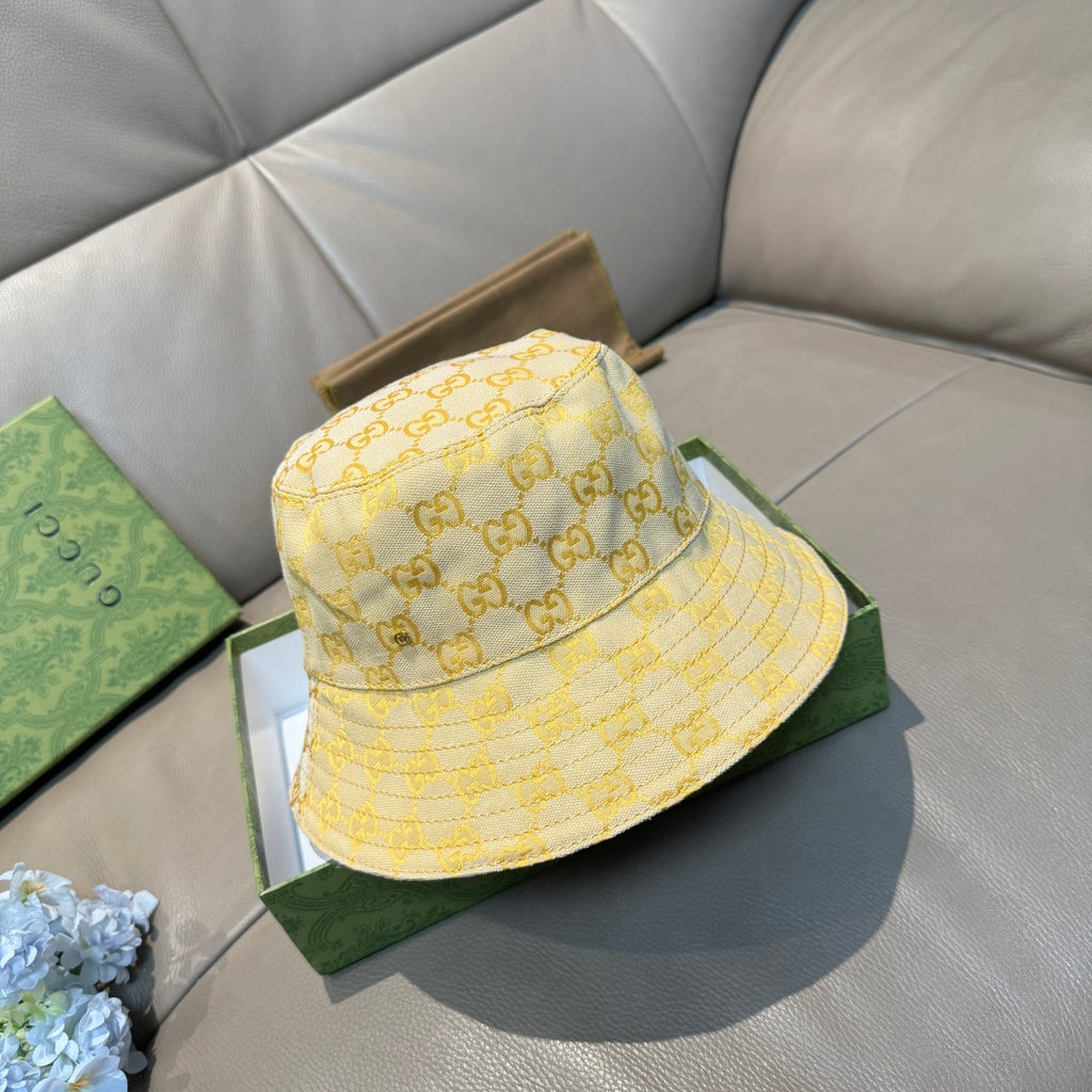 Gucci yellow GG monogram bucket hat with quilted texture and curved brim