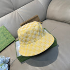 Gucci yellow GG monogram bucket hat with quilted texture and curved brim