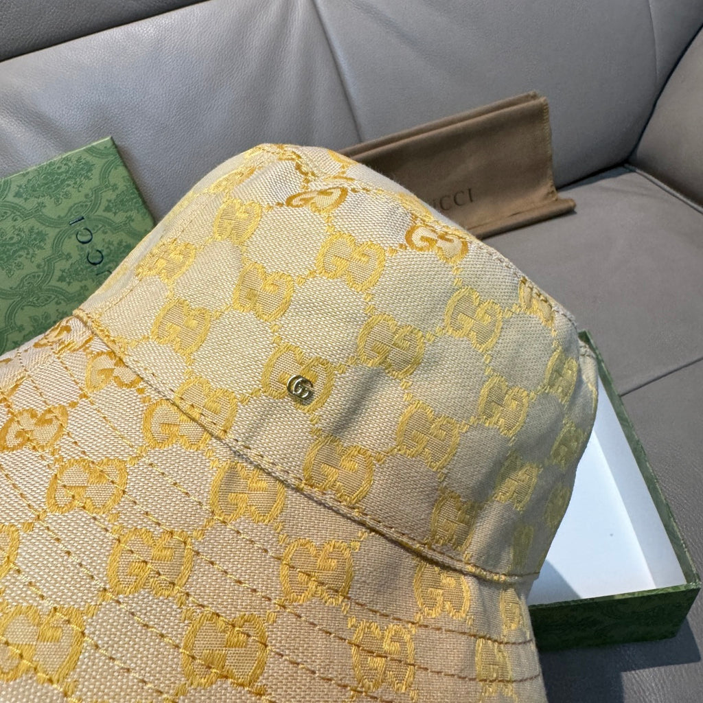 Gucci yellow GG monogram bucket hat with stitched front band and side panel