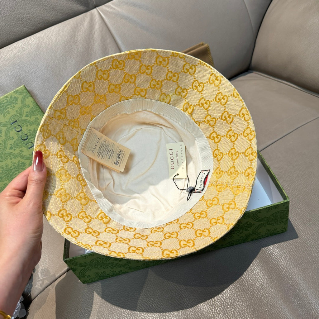 Gucci yellow GG monogram bucket hat with inner lining and label tags