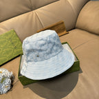 Gucci GG monogram light blue bucket cap with stitched brim and metal logo button