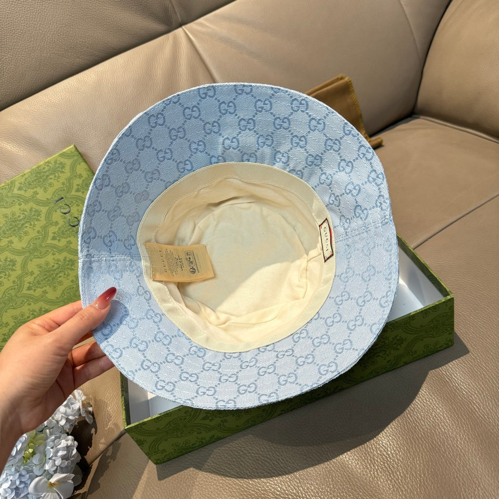 Gucci GG monogram light blue bucket cap with cream inner lining and interior label