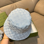 Gucci GG monogram light blue bucket cap with all-over pattern and curved brim stitching