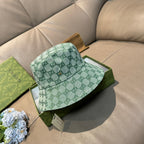 Green GG monogram bucket hat with curved brim and front tab detail