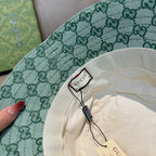 Green GG monogram bucket hat close-up of inner cream lining and product tags
