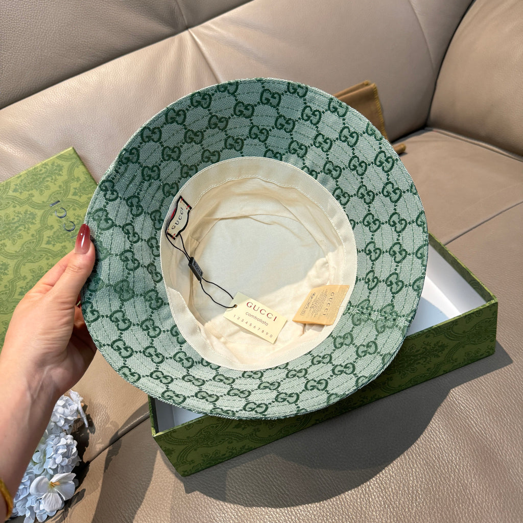 Green GG monogram bucket hat interior with cream lining and Gucci label