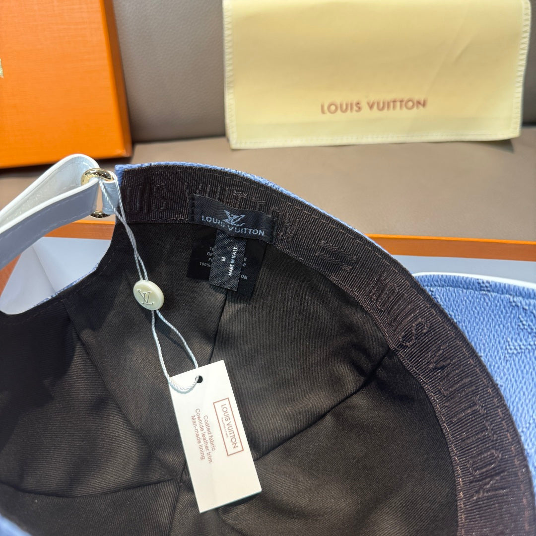 Louis Vuitton baseball cap interior with black lining, printed strap, and hang tags
