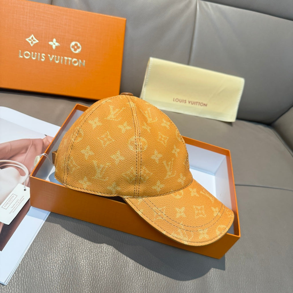 Louis Vuitton monogram baseball cap in tan/orange with curved brim and top seam