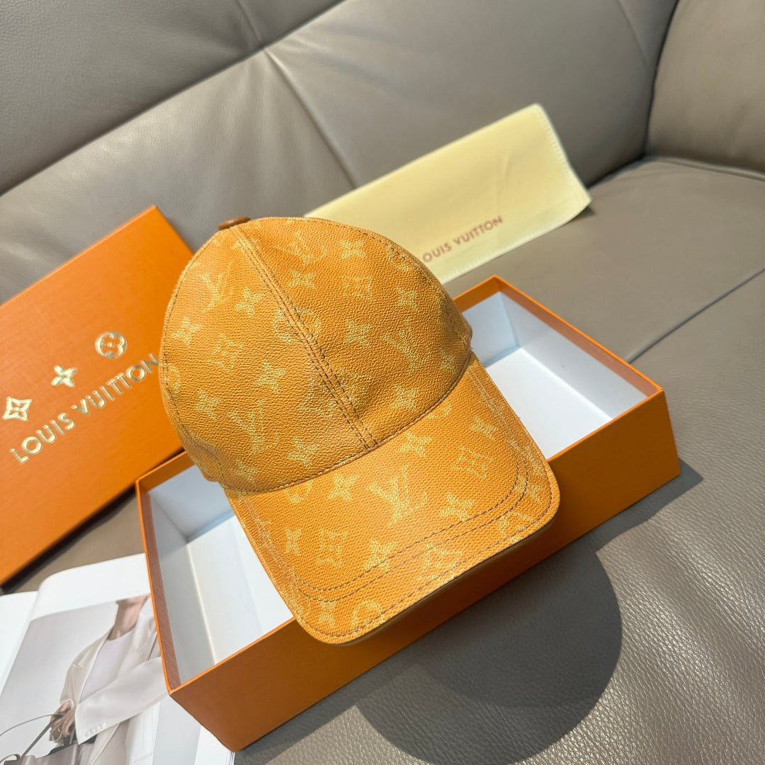 Louis Vuitton monogram baseball cap in tan/orange with curved brim