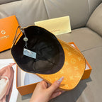 Louis Vuitton monogram cap with black interior lining and adjustable strap