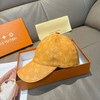 Louis Vuitton monogram baseball cap in tan/orange with stitched crown and brim