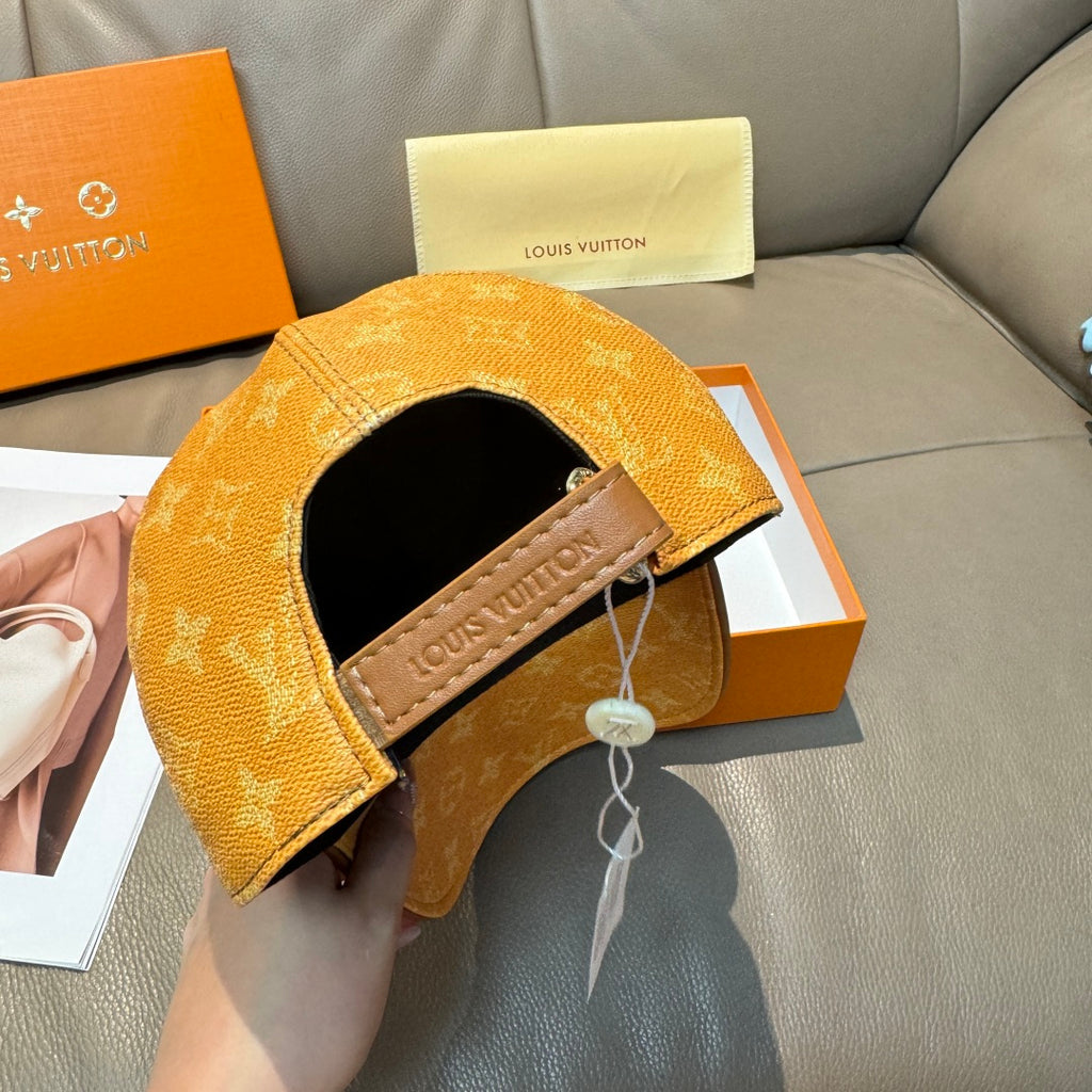 Louis Vuitton monogram cap with adjustable strap and black interior opening