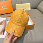 Louis Vuitton monogram baseball cap in tan/orange with back strap and curved brim