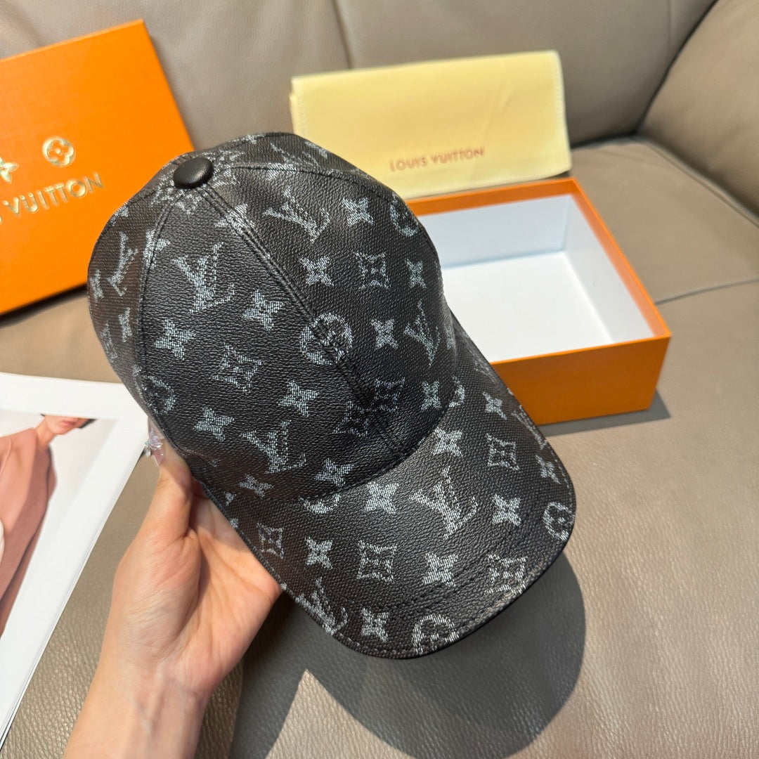 Monogram canvas cap, dark logo pattern with front button and curved brim